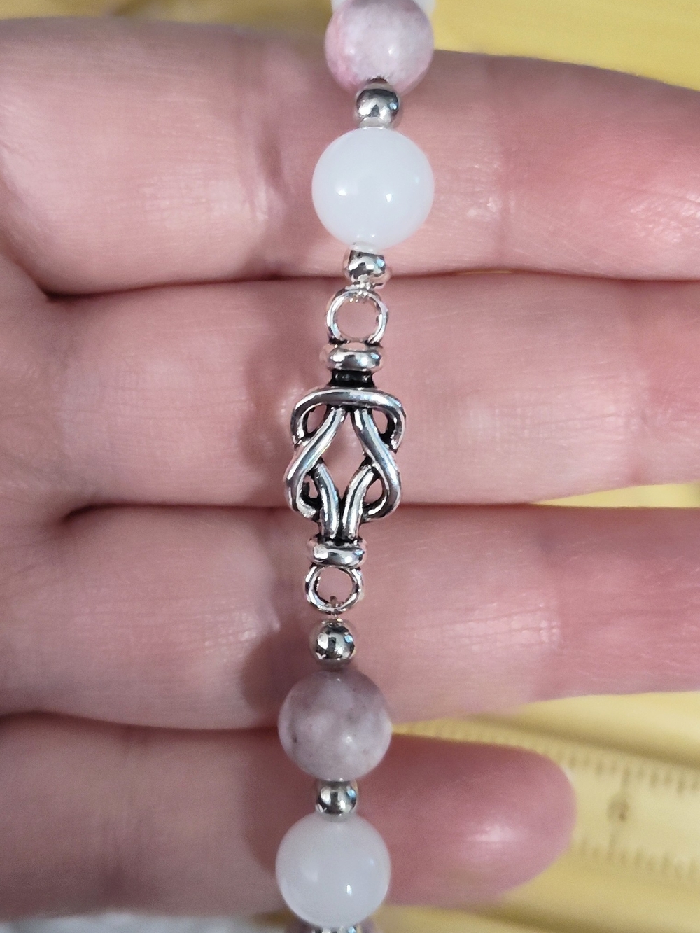 Handcrafted love knot stretch bracelet with quartz and pink howlite